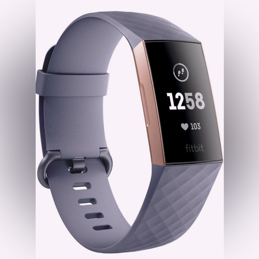 Rose Gold Fitbit Charge 3 with a black wristband. Adorable!